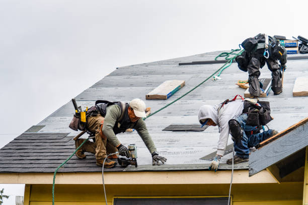 Professional Gutter Installation technician working in Durham, NC